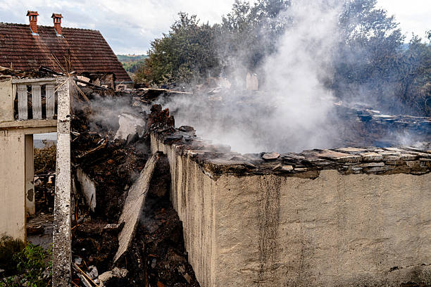 Professional Emergency Fire Cleanup technician working in Camden, NJ
